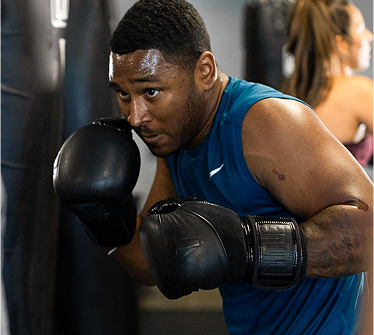 Man Kickboxing